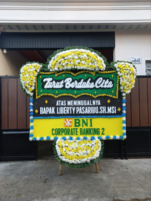 Papan Bunga Duka di Harapan