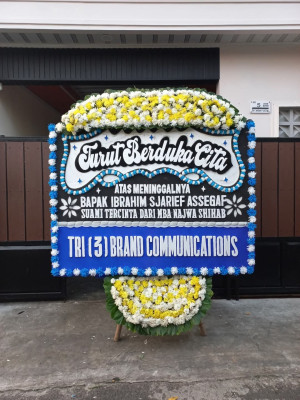 Papan Bunga Duka di Harapan